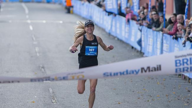 The Sunday Mail Transurban Bridge to Brisbane finish line on Sunday 28 August 2022. 10km women's winner Cassie Fien. Picture: Jerad Williams