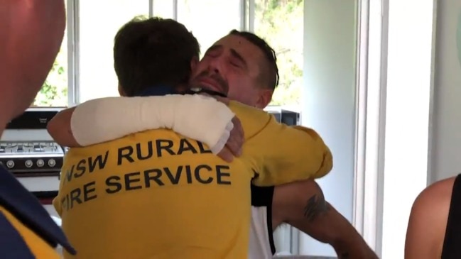 Troy Pauling reunited with fireys who saved his family