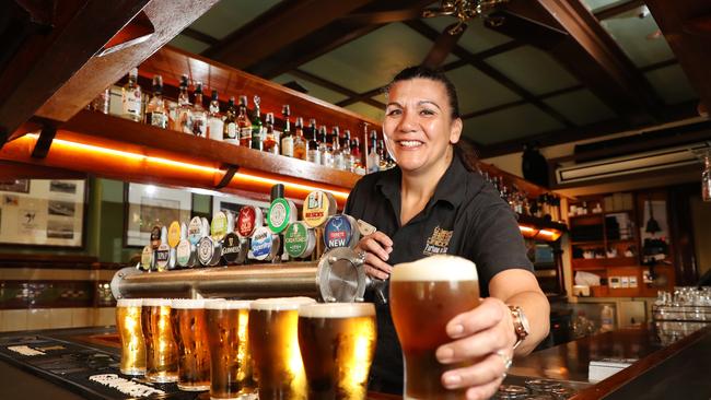 Jen Rounds is a bartender at the Fortune of War pub at The Rocks in Sydney. Her bar and other hospitality venues could soon be subject to new, more lenient COVID-19 rules. Picture: Richard Dobson