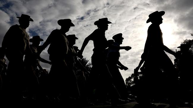 Servicemen and women march to the Shrine of Remembrance. Picture: AFP