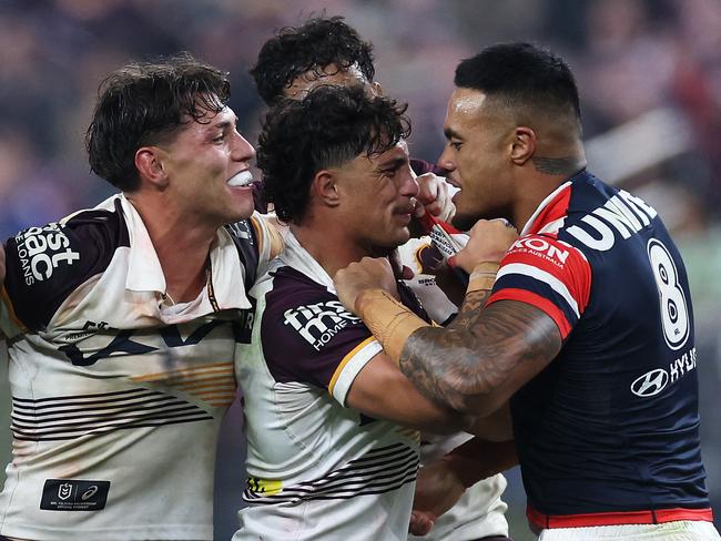 Spencer Leniu of the Roosters exchanges heated words with Brisbane’s Kotoni Staggs. Picture: Getty Images via AFP