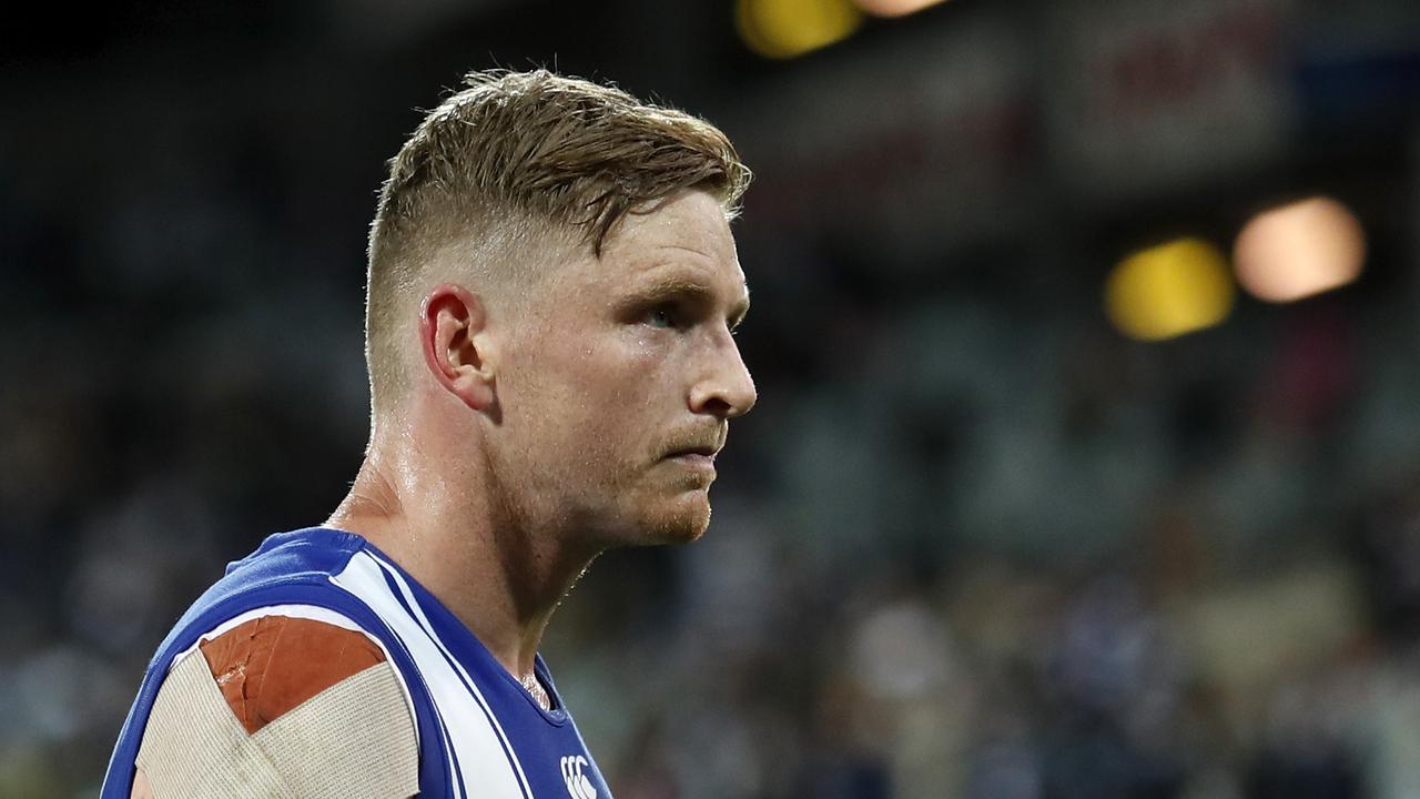 GEELONG, AUSTRALIA – APRIL 18: Jack Ziebell of the Kangaroos reacts after a loss during the 2021 AFL Round 05 match between the Geelong Cats and the North Melbourne Kangaroos at GMHBA Stadium on April 18, 2021 in Geelong, Australia. (Photo by Dylan Burns/AFL Photos via Getty Images)