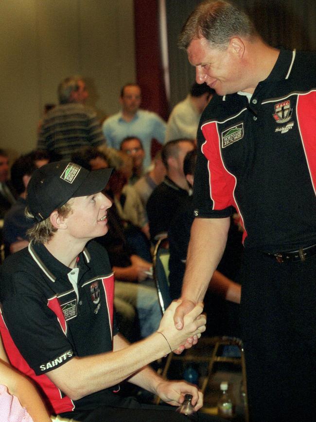 Goddard is congratulated by Grant Thomas after he was drafted by the Saints at pick one.