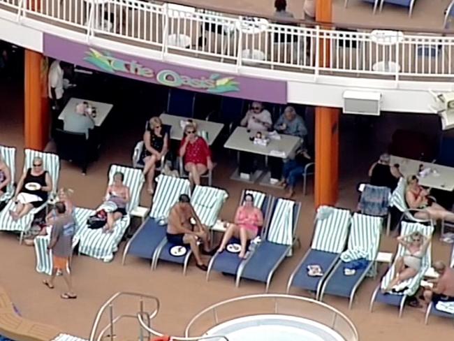 Passengers seem unfazed as they relax aboard the cruise ship that lost power off the coast of Victoria. Picture: Seven News