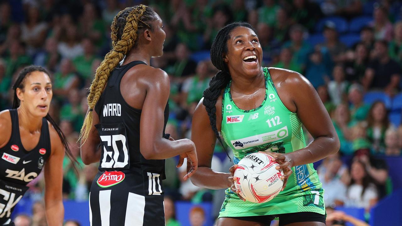 Jhaniele Fowler of the fever laughs as she takes a shot at goal. (Photo by James Worsfold/Getty Images)