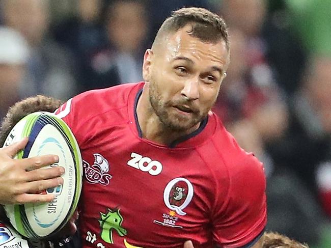 MELBOURNE, AUSTRALIA - MAY 13:  Quade Cooper of the Reds is tackled  during the round 12 Super Rugby match between the Melbourne Rebels and the Queensland Reds at AAMI Park on May 13, 2017 in Melbourne, Australia.  (Photo by Scott Barbour/Getty Images)