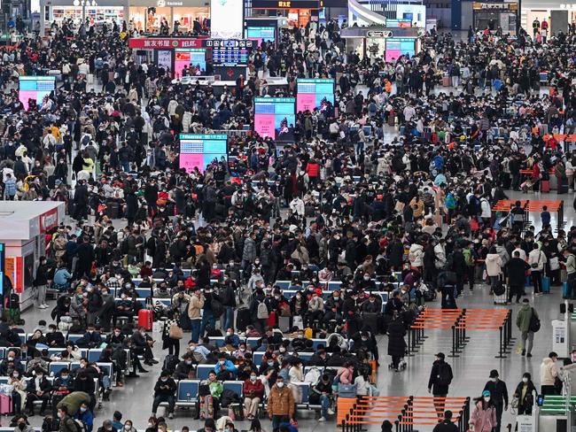 Passengers wait for trains at Hongqiao railway station in Shanghai. Picture: AFP
