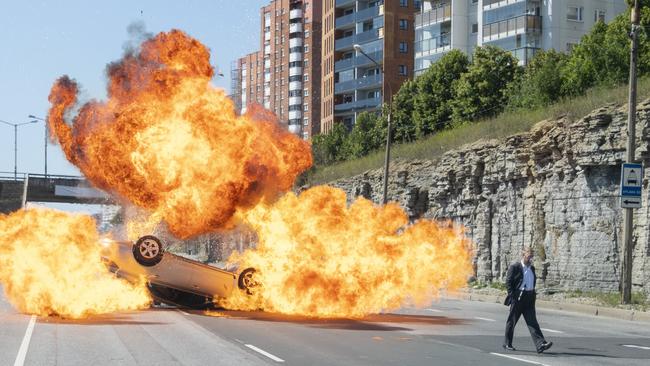 Kenneth Branagh walks away from an explosion in Tenet. Picture: Melinda Sue Gordon