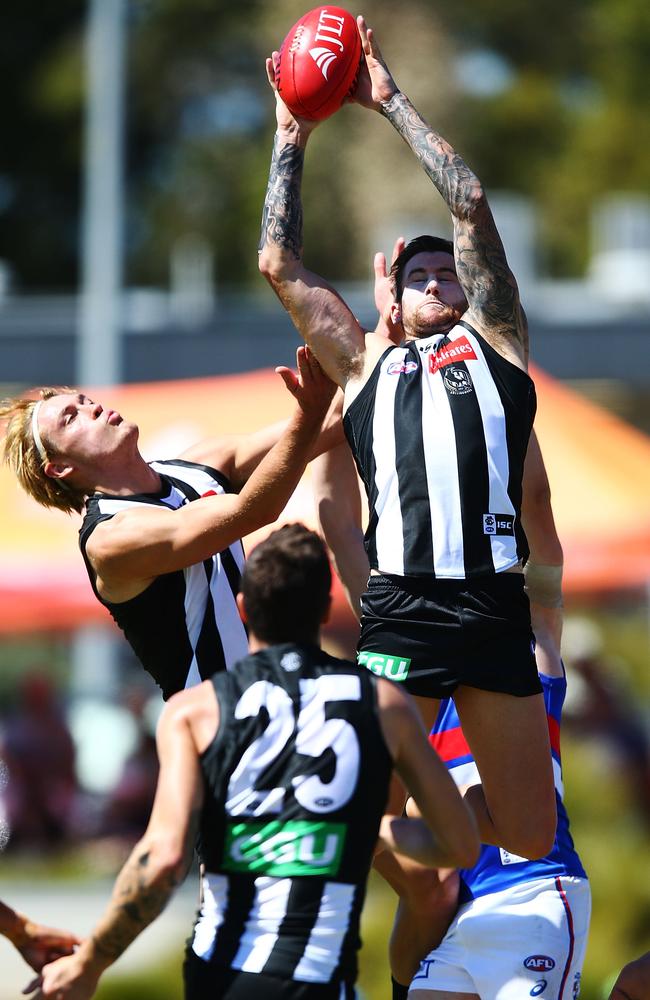 Darcy Moore (left) will give Jeremy Howe some help in defence this year.