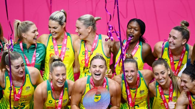 LONDON, ENGLAND – JANUARY 19: Liz Watson of Australia lifts the Vitality Series Trophy with teammates after victory in the 2022 Netball Quad Series match between Vitality Roses and Australia at Copper Box Arena on January 19, 2022 in London, England. (Photo by Alex Davidson/Getty Images)