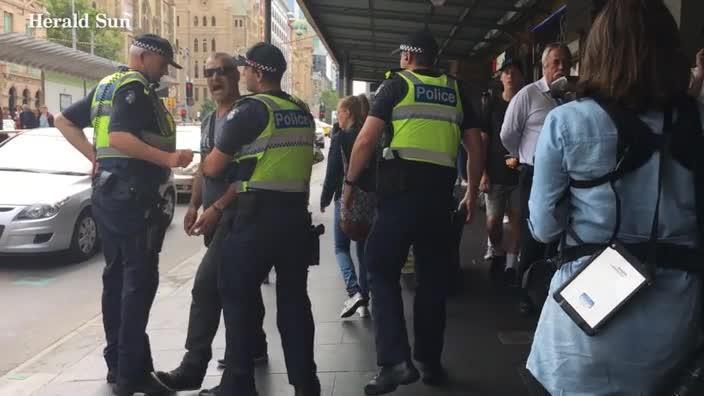 Man clashes with homeless at Flinders Street Station                        