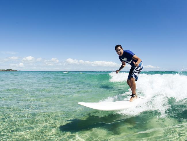North Stradbroke Island Surf School. Picture: Tourism and Events Queensland