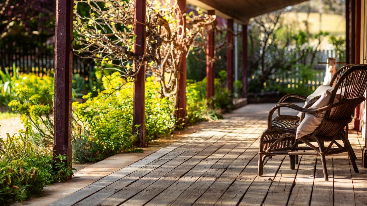 The front verandah at the main homestead looks out over the extensive grounds.