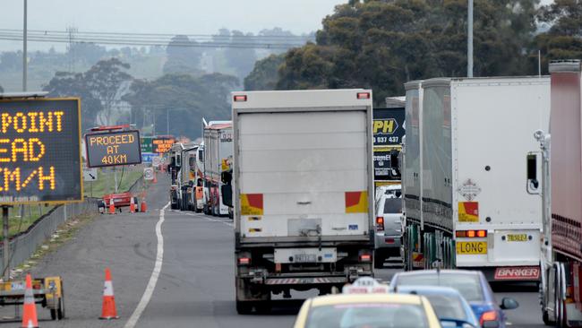 Traffic banked back at a checkpoint on the Hume Freeway. Picture: Andrew Henshaw