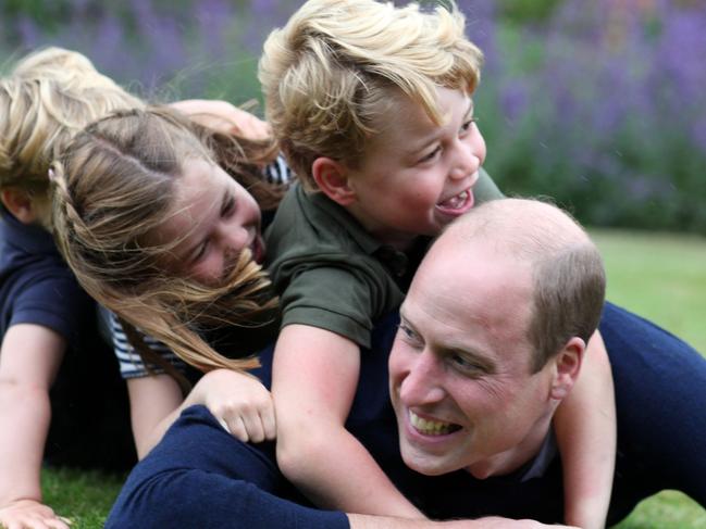 Prince William with his children. Picture: AFP