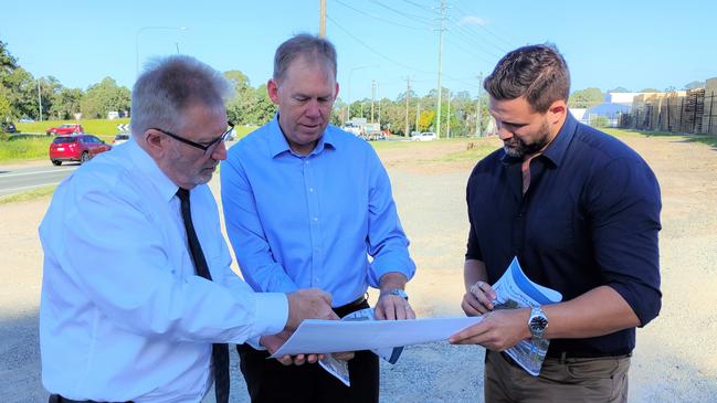 Local MPs Michael Crandon and Bert van Manen and northern Gold Coast councillor Mark Hammel have been working since June to get the TMR to reconsider a northbound slip land at the under-construction revamp of Exit 41.