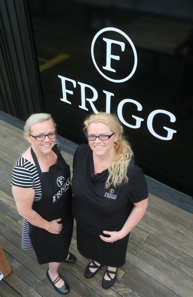 Twin sisters and owners of the Frigg Cafe at Labrador Maria Elita (striped shirt and Apron) and Toula Scott Black Dress. Picture Mike Batterham