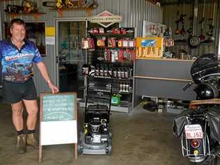 Peter Jongedyk's busy with mower repairs following the first rains of the Rockhampton season. Picture: Jann Houley