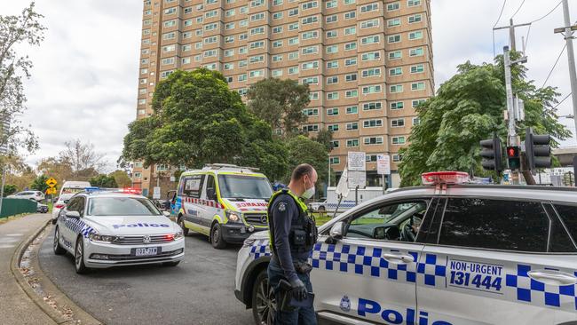 The scene outside Flemington public housing on Sunday as residents were notified that they would be tested for coronavirus. Picture: Getty Images