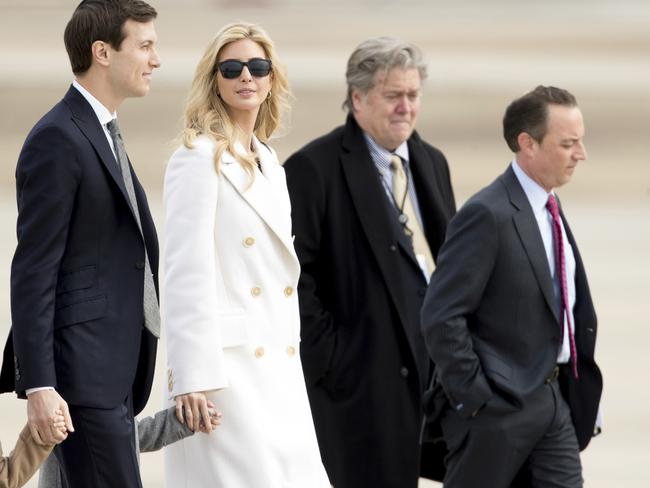 Ivanka Trump, with husband Jared Kushner, left, Steve Bannon, second from the right, and former Chief of Staff Reince Priebus, far right. Picture: Andrew Harnik/AP