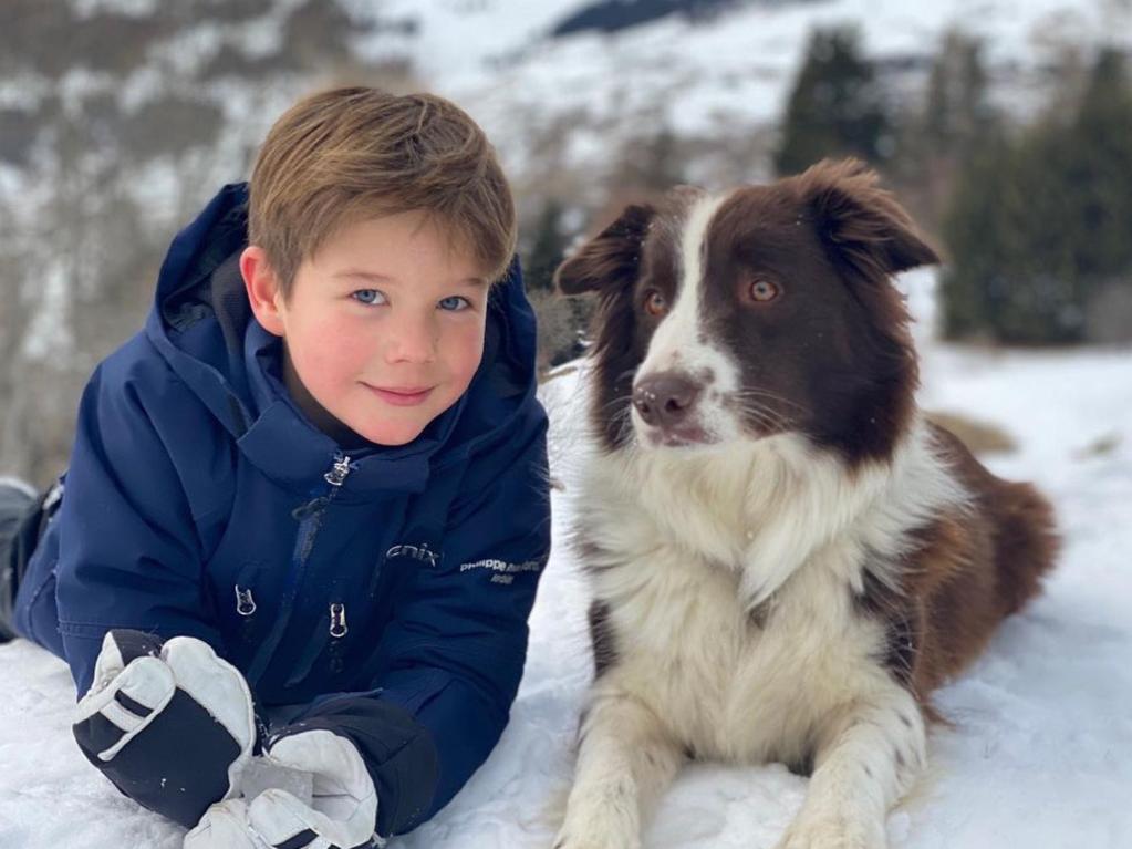 Prince Vincent chills out with Grace the dog while in Verbier, Switzerland. Picture: H.K.H. Kronprinsessen and Kongehuset