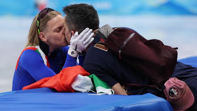 Arianna Fontana celebrates with her partner after winning the Gold medal. Photo by Matthew Stockman/Getty Images.