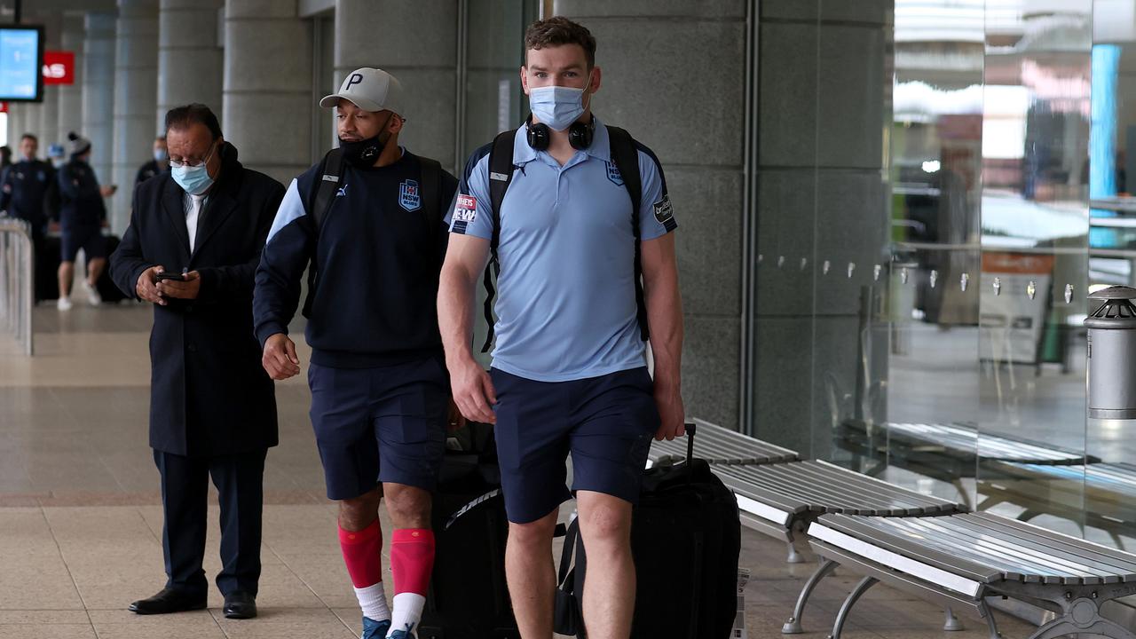 NSW forward Liam Martin is all masked up at Sydney Airport. Picture: Dylan Coker