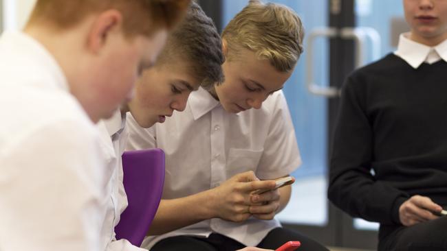 Cyber safety experts warn that parents are trying to sneak devices into classrooms in the wake of mobile phone bans.