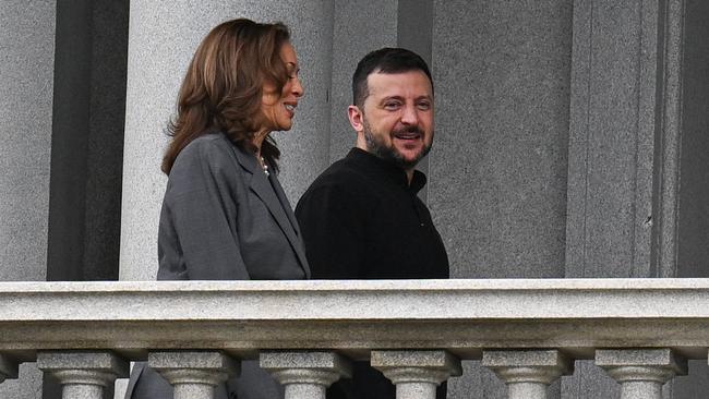 Ms Harris and Mr Zelensky walking on the balcony of her office. Picture: Drew Angerer/AFP