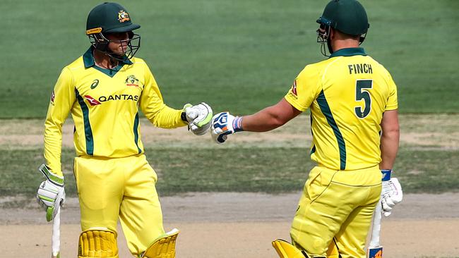 Usman Khawaja (left) and Aaron Finch could open the batting for Australia at the World Cup. Picture: AFP 