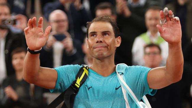 PARIS, FRANCE - MAY 27: Rafael Nadal of Spain waves to the crowd as he walks off after his defeat by Alexander Zverev of Germany in the Men's Singles first round match on Day Two of the 2024 French Open at Roland Garros on May 27, 2024 in Paris, France. (Photo by Clive Brunskill/Getty Images)