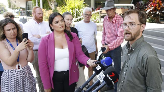 Community Organiser from Rising Tide, Zack Schofield speaks outside Newcastle Local Court. Picture: John Appleyard