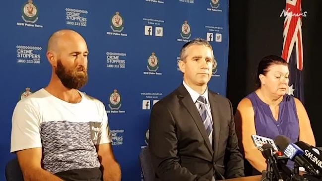 Homicide squad commander Detective Superintendent Scott Cook and Julie Ann Stewart speak at press conference about murder of Mark Russell