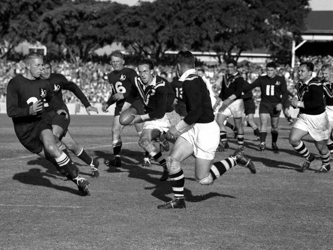 From left, Sel Belsham, Des McGovern, Don Furner, Gary Parcell and Vern Maxwell as Queensland plays New Zealand in rugby league at the Gabba in 1956