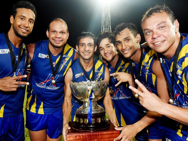 Thomas, Daniel, Aaron, Jerome, Marlon and Shannon Motlop after their Wanderers outfit won the 2014-15 NTFL flag. Picture: Elise Derwin