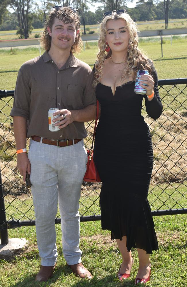 Harrison Broome and Chloe Glover at the Yeppoon race day at Keppel Park racecourse on April 26, 2025.