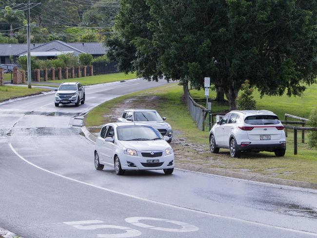 Cars parked on the nature strip in front of Pioneer Downs Park in Worongary. Picture: Jerad Williams.