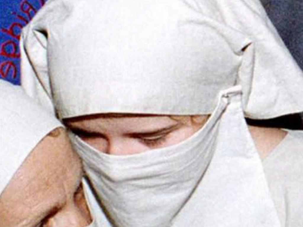 She was disguised by wearing a veil and white robes which Mitchell explained away as a religious garment. Picture: KCTV