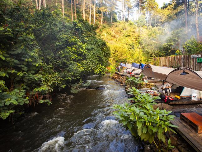 Camping tour in a pine forest area on the banks of the Palayangan river in Pangalengan, Bandung Regency, Indonesia. This natural tourism is one of the choices for urban communities to travel.Escape 27 October 2024Why I travelPhoto - iStock