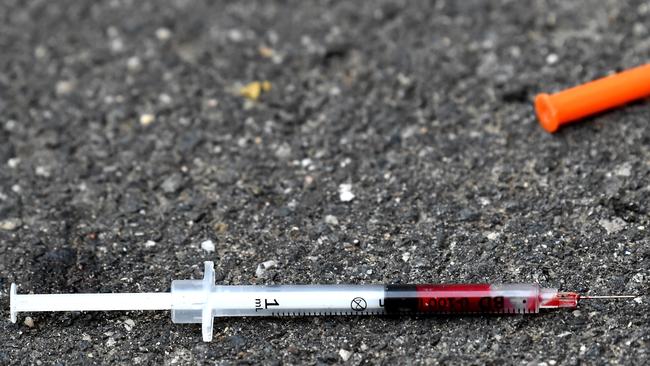 A blood filled needle in a Richmond laneway. Picture: Nicole Garmston