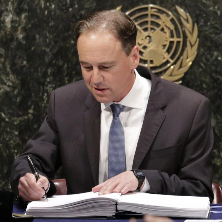 Australia’s then environment minister Greg Hunt signs the Paris Agreement on behalf of our nation in 2016. Picture: AP Photo