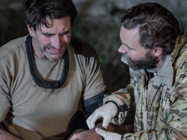 **STRICT EMBARGO FOR MONDAY NIGHT ONLINE 9PM** -MUST CONTACT ADRIAN ON NWK PIC DESK BEFORE PUBLISHING**EMBARGOED FOR TUESDAY PAPERS** Pete Murray with the doctor after an injury he sustained on Seven's SAS Australia.Picture: Seven/ Supplied (under embargo)