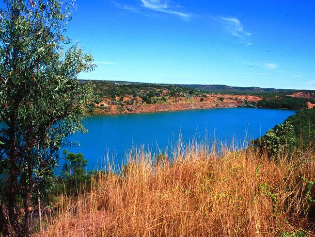 06 Jul 2004. Pine Creek, NT - former Enterprise mining Pit is now transformed into a lake. scenic travel history