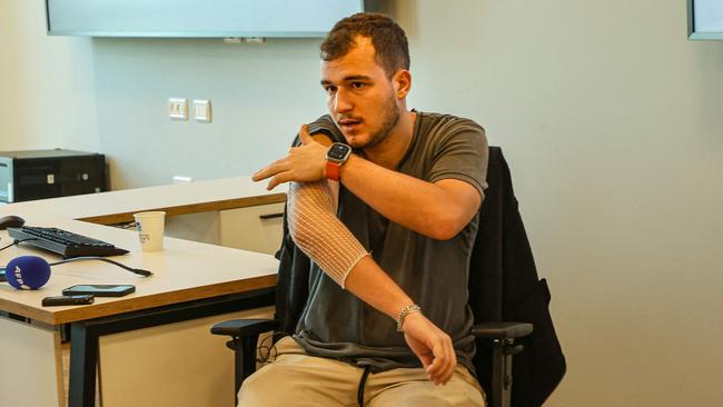 Israeli 24-year-old Tomer Zadik, who has been receiving treatment at the Ichilov medical centre since being shot in the arm at the Supernova music festival on October 7. Picture: AFP