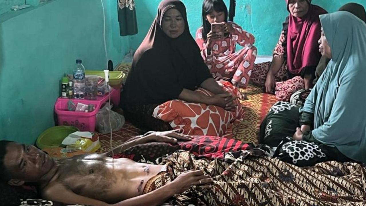 Mohammad Iqbal hooked up to an IV drip in his village: Amanda Hodge.