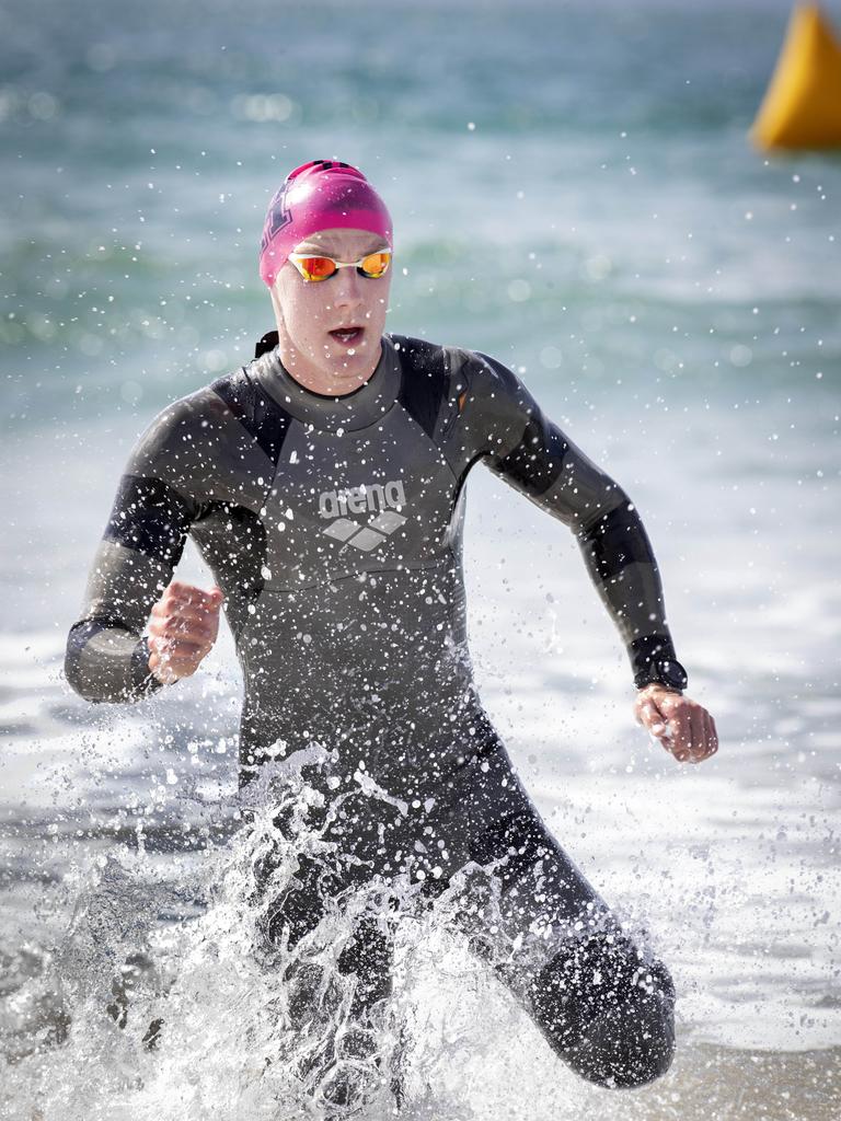 Sam Askey- Doran was first to finish the swim leg during the Seven Mile Beach Gala Day Triathlon. Picture: Chris Kidd