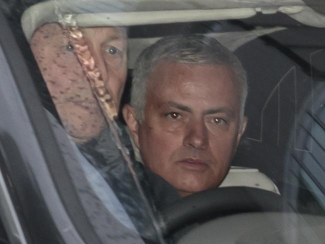 Manchester United former manager Jose Mourinho leaves the Lowry Hotel in Manchester, England, Tuesday, Dec. 18, 2018. Jose Mourinho was fired by Manchester United on Tuesday after failing to restore its status as a major European force in a turbulent 2Â½-year spell marked by clashes with players and increasing disgruntlement at the team's style of play. (AP Photo/Jon Super)