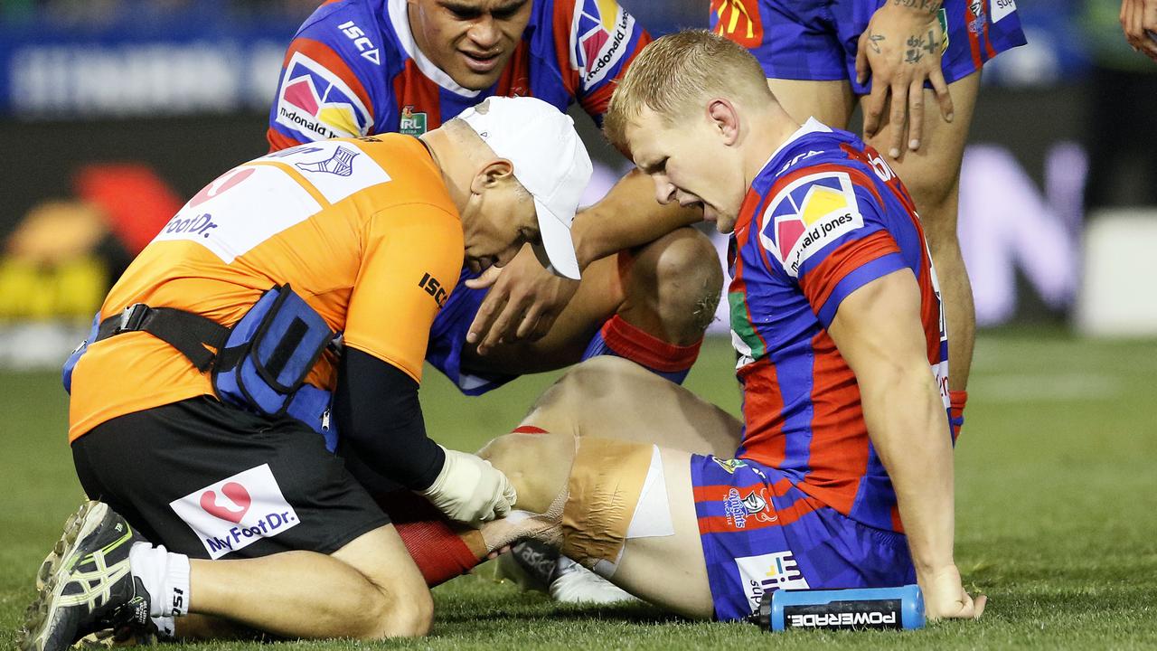 Knights hooker Slade Griffin had his fourth knee reconstruction after this incident against the Bulldogs in round 16 of the 2018 season. (AAP Image/Darren Pateman) 