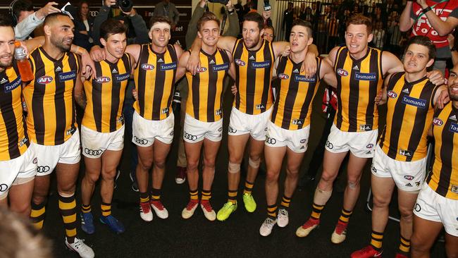 Hawthorn players sing the song after their win against Essendon. Picture: Michael Klein