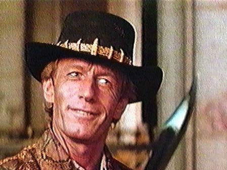 'Crocodile Dundee' actor Paul Hogan PICT SUPPLIED . headshot film scene movies hunting knife bowie ? hat